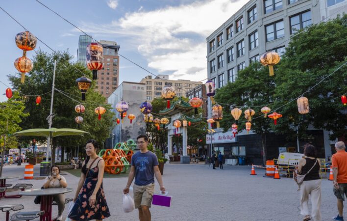 A vibrant canopy of light over Chin Park Plaza, the installation of "Lantern Stories" by Yu-Wen Wu features 30 large lanterns of various shapes and sizes which illustrate the history and imagine the future of Boston's Chinatown.